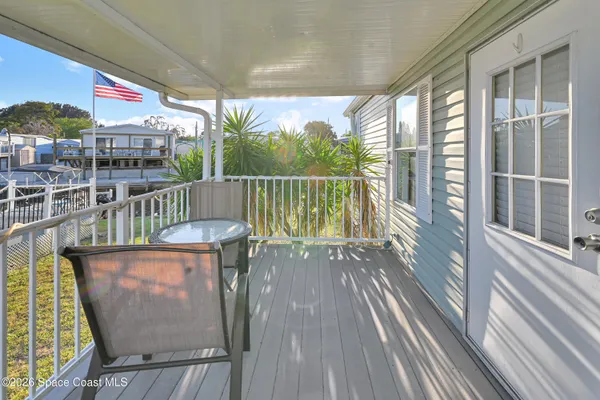 a view of balcony with a potted plant