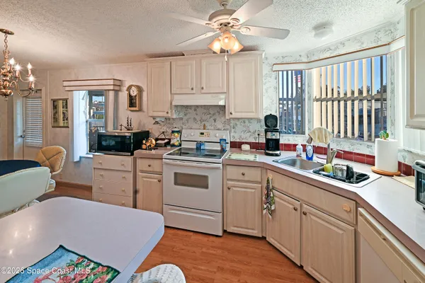 a bedroom with furniture and a bed