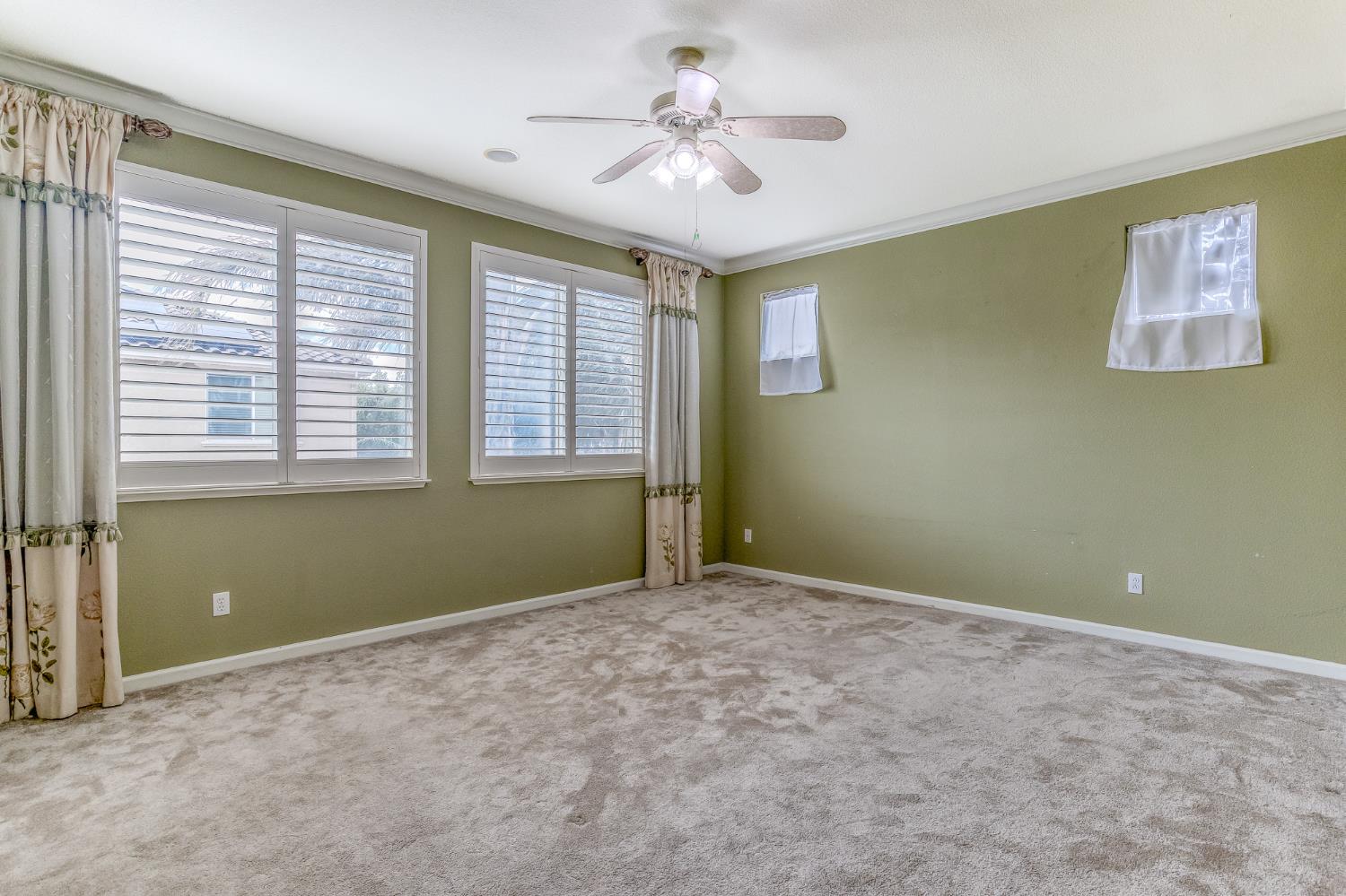 188 Thomsen Road Lathrop, CA 95330 - Photo 21 of 27 a view of empty room with window and ceiling fan