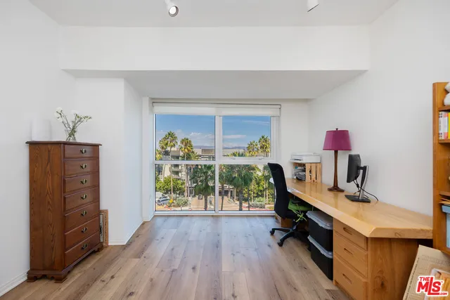 a room with furniture and a wooden floor
