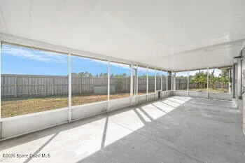 a house view with a backyard space