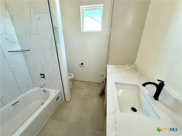 a bathroom with a bathtub