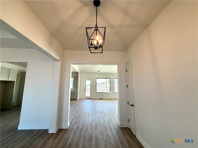 a view of livingroom with wooden floor