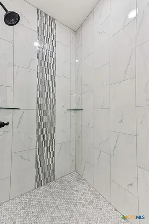 a view of a bathroom with shower