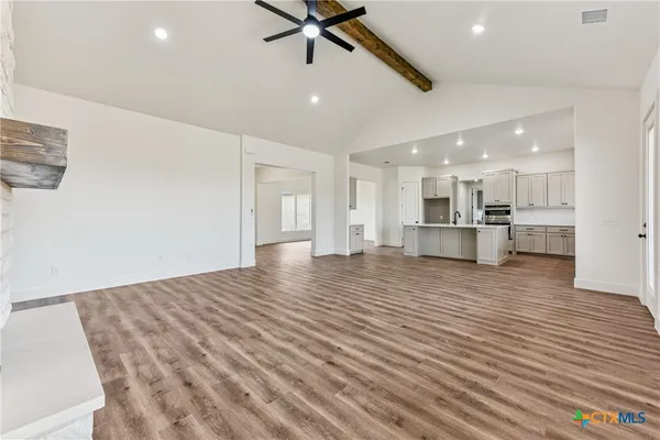 a view of kitchen and windows