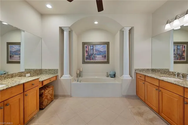 a spacious bathroom with a bathtub and a shower