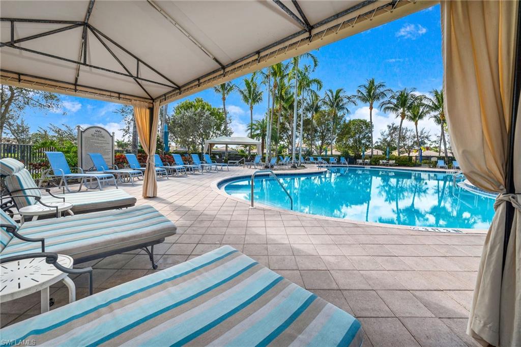 6529 Marbella Drive Naples, FL 34105 - Photo 21 of 29 a view of swimming pool with a patio