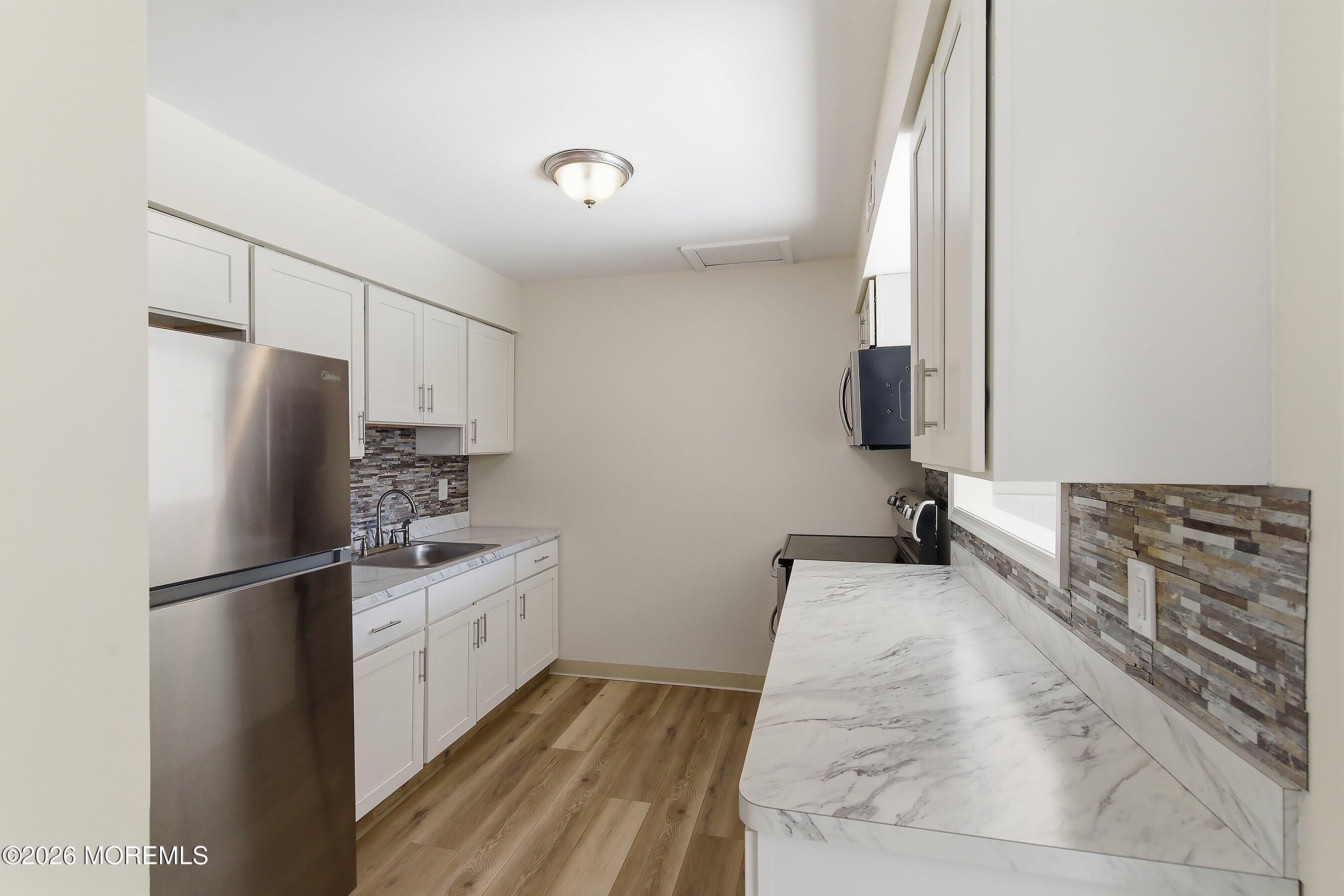 40 Greenwood Loop Road Brick, NJ 08724 - Photo 3 of 24 08-Kitchen 1B
