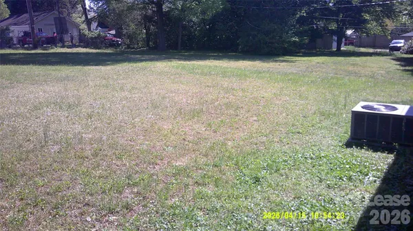 a view of a yard with an outdoor space