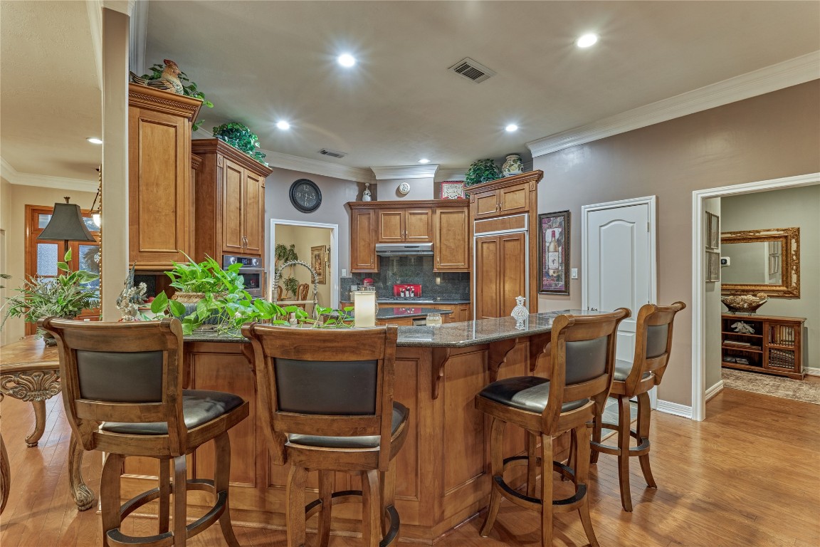 27 Bent Tree Lane Montgomery, TX 77356 - Photo 25 of 50 A spacious breakfast island offers extra seating, perfect for casual dining and entertaining