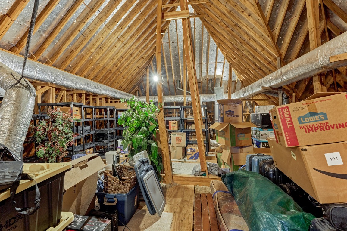 27 Bent Tree Lane Montgomery, TX 77356 - Photo 39 of 50 A massive attic offers incredible storage capacity, making it perfect for keeping seasonal items organized.