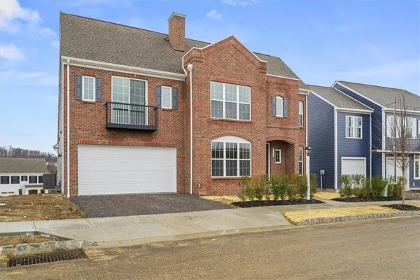 a front view of multiple houses