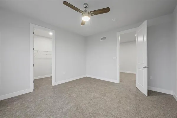 a view of a room with racks on the wall