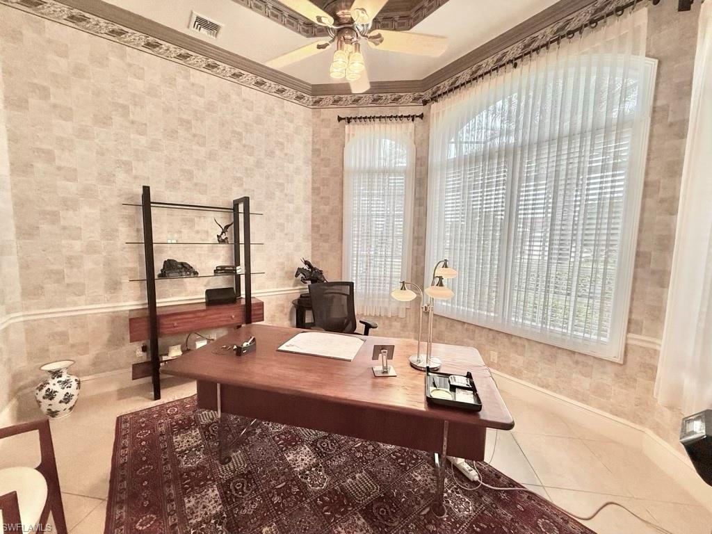 8064 Tiger Lily Drive Naples, FL 34113 - Photo 15 of 21 a view of a workspace with furniture