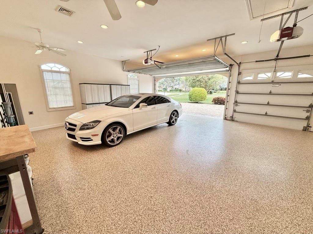 8064 Tiger Lily Drive Naples, FL 34113 - Photo 8 of 21 a car parked in parking garage