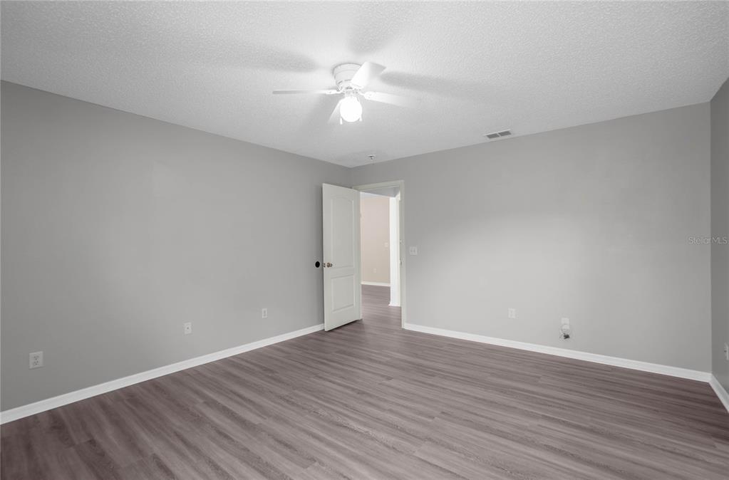 3926 East Bennett Street Inverness, FL 34453 - Photo 16 of 33 a view of an empty room with wooden floor