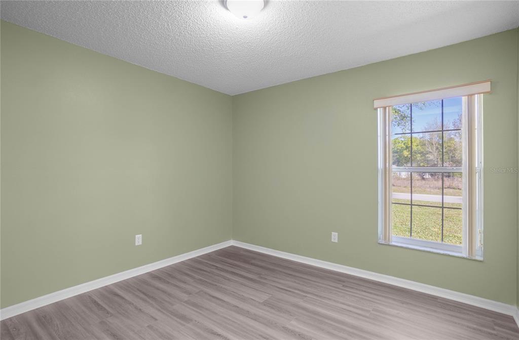 3926 East Bennett Street Inverness, FL 34453 - Photo 22 of 33 an empty room with a window