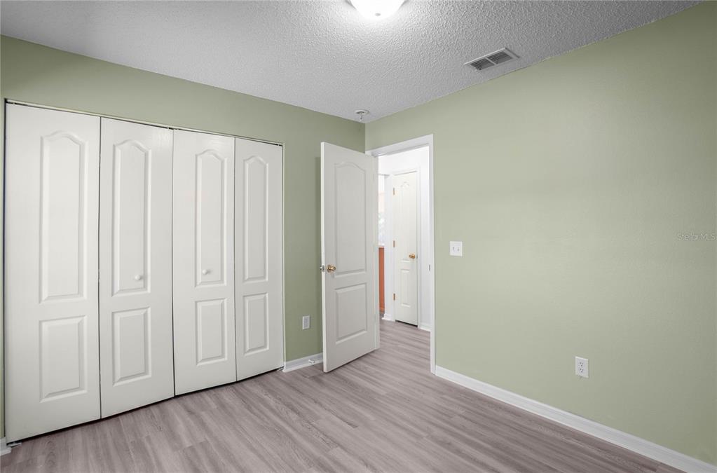 3926 East Bennett Street Inverness, FL 34453 - Photo 23 of 33 a view of a room with wooden floor