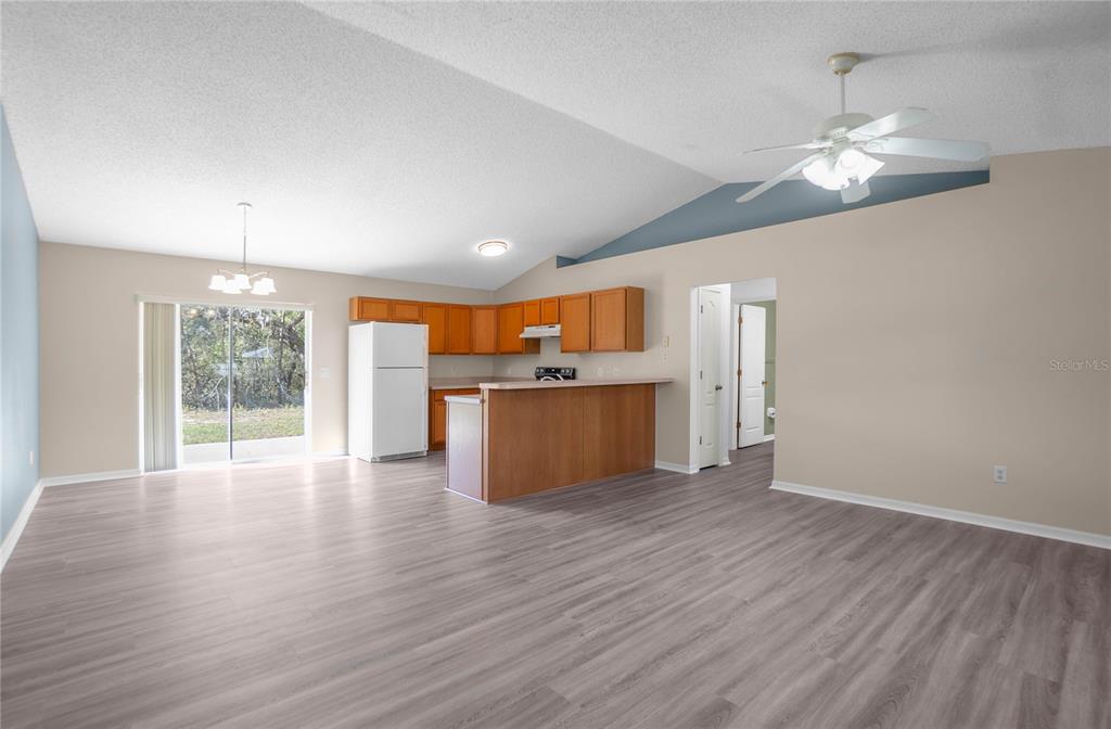 3926 East Bennett Street Inverness, FL 34453 - Photo 10 of 33 a view of kitchen with cabinets and wooden floor
