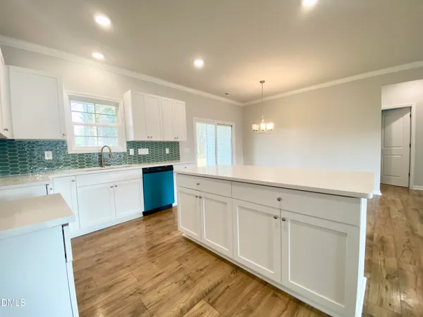 a large kitchen with cabinets