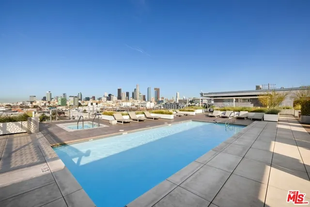 a view of an outside dining space with furniture