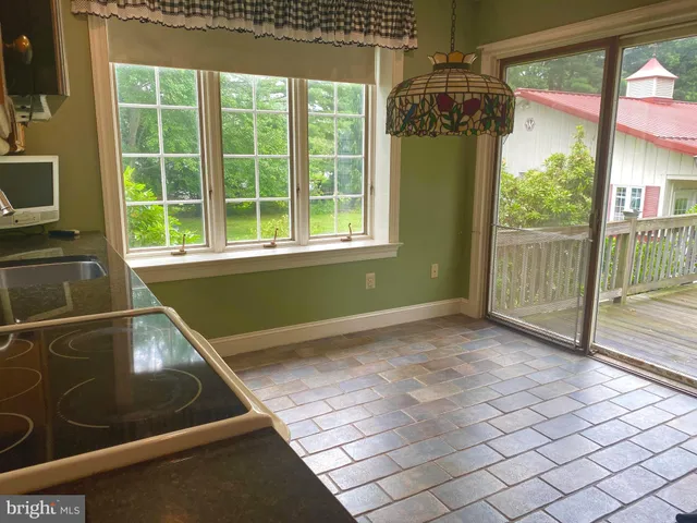 a view of a room with windows