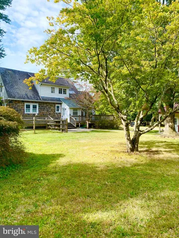 a front view of a house with swimming pool