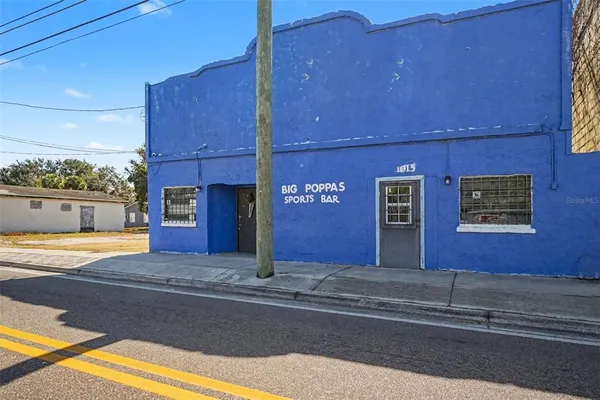 a view of a house with a swimming pool