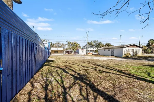 a view of a backyard of the house