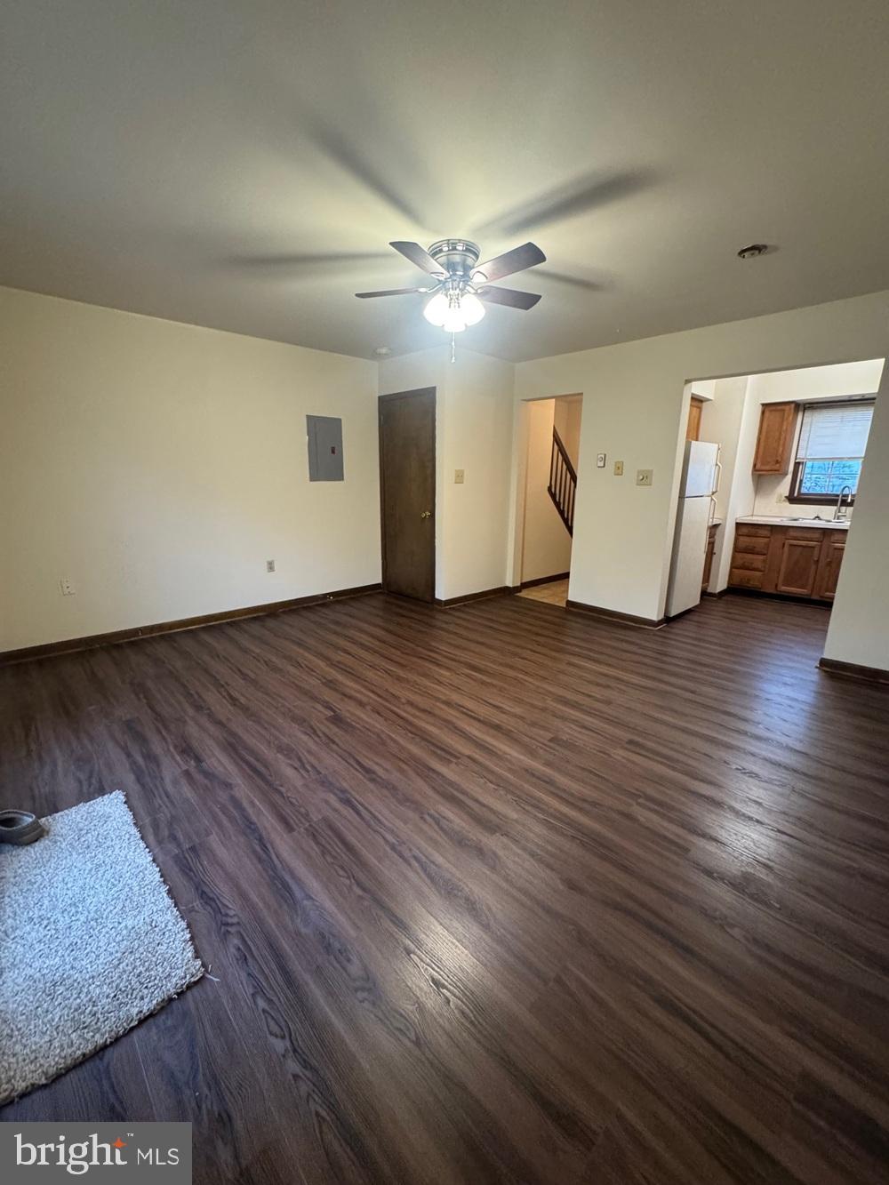 742 Newport Avenue Gap, PA 17527 - Photo 2 of 9 a view of a livingroom with wooden floor and a ceiling fan