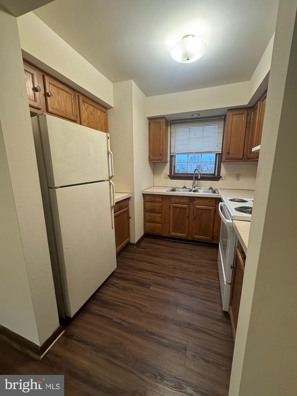 742 Newport Avenue Gap, PA 17527 - Photo 4 of 9 a kitchen with a refrigerator a stove top oven a sink and dishwasher
