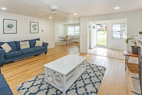 a living room with furniture and a table
