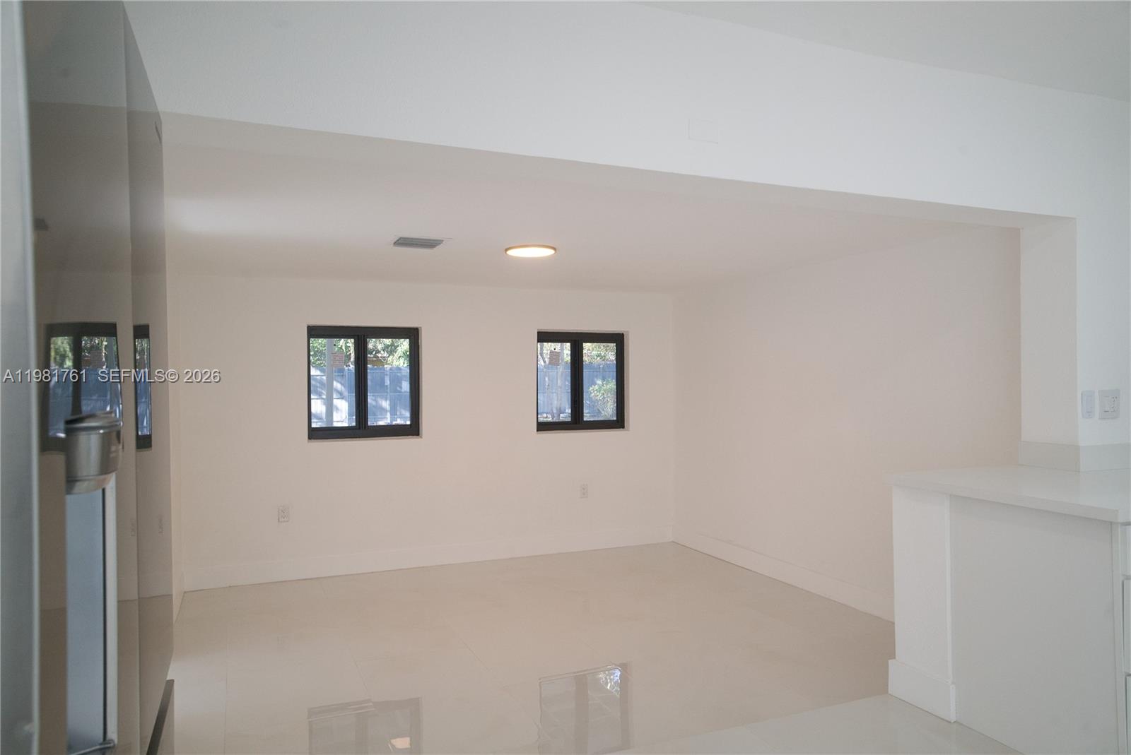 315 Northwest 127th Street North Miami, FL 33168 - Photo 26 of 67 an empty room with windows