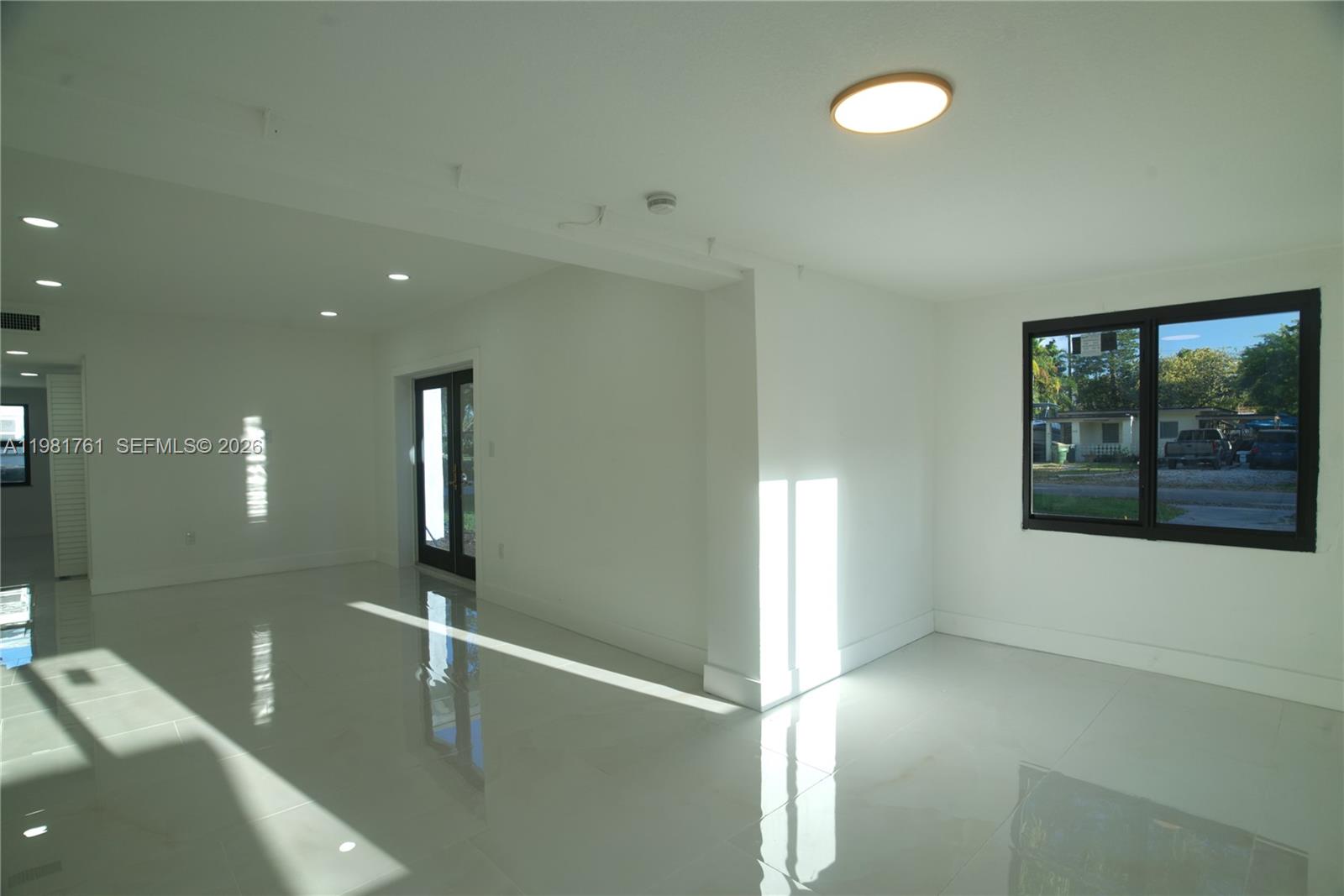 315 Northwest 127th Street North Miami, FL 33168 - Photo 40 of 67 a view of a living room with a large window
