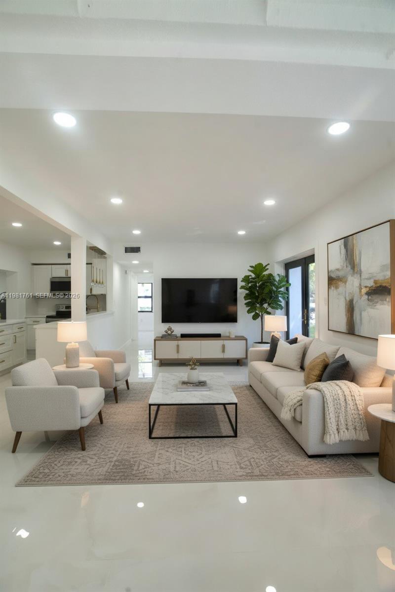315 Northwest 127th Street North Miami, FL 33168 - Photo 4 of 67 a living room with furniture and a flat screen tv