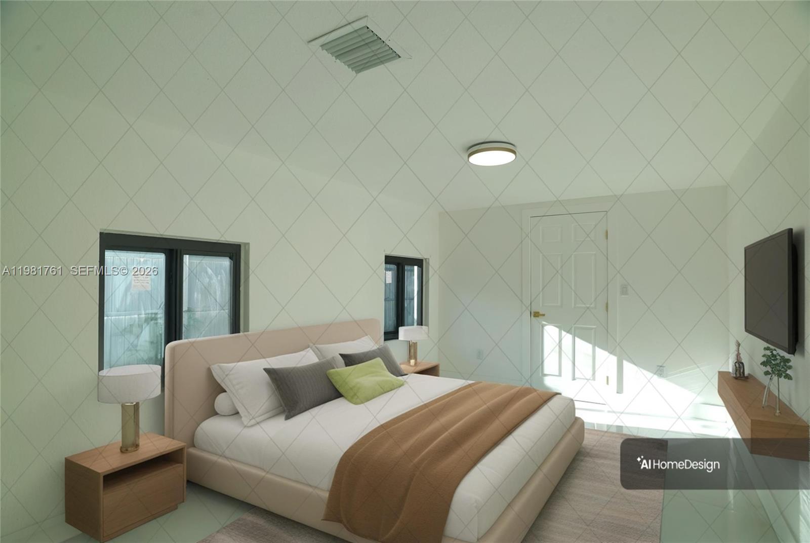 315 Northwest 127th Street North Miami, FL 33168 - Photo 9 of 67 a bedroom with a bed and a flat screen tv