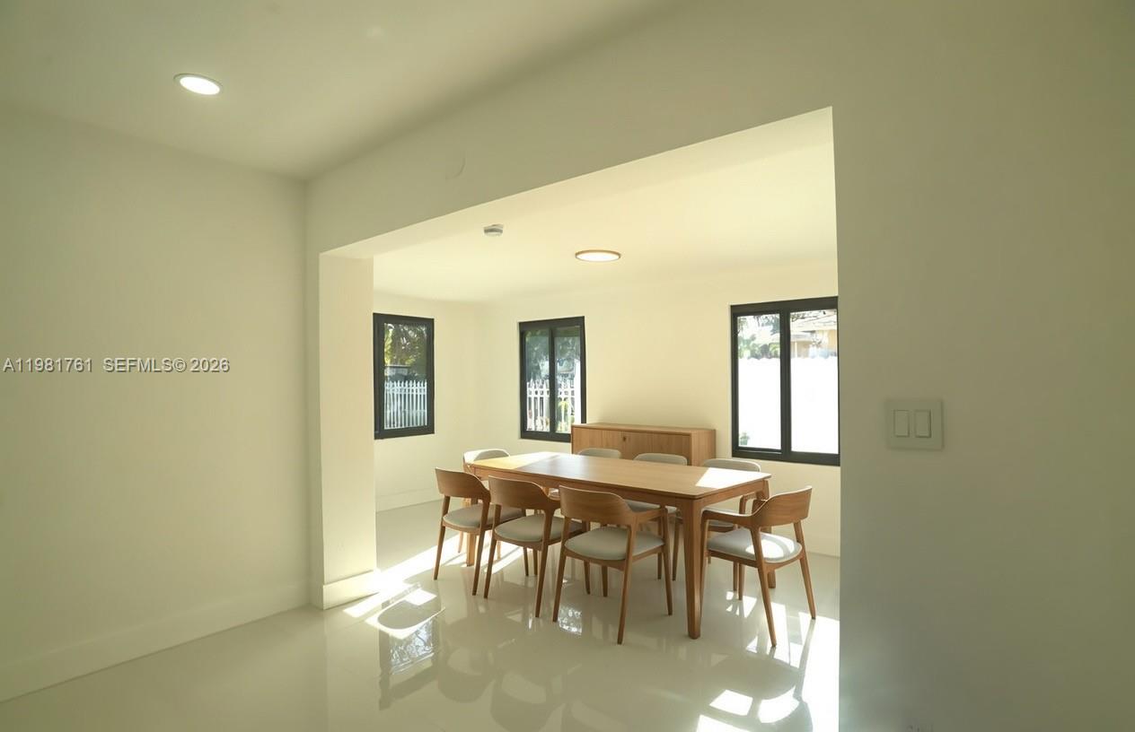 315 Northwest 127th Street North Miami, FL 33168 - Photo 10 of 67 a view of a dining room with furniture and window