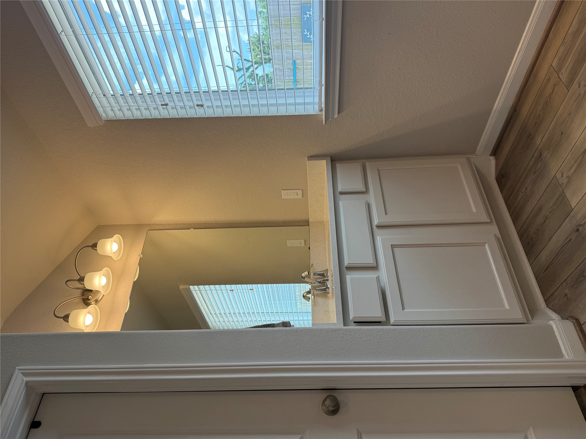 2336 Hagerman Road Conroe, TX 77384 - Photo 24 of 35 a bathroom with a sink and a mirror