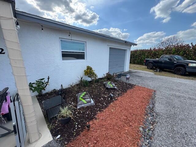 4472 Alden Avenue Stuart, FL 34997 - Photo 24 of 30 Home Front Garage