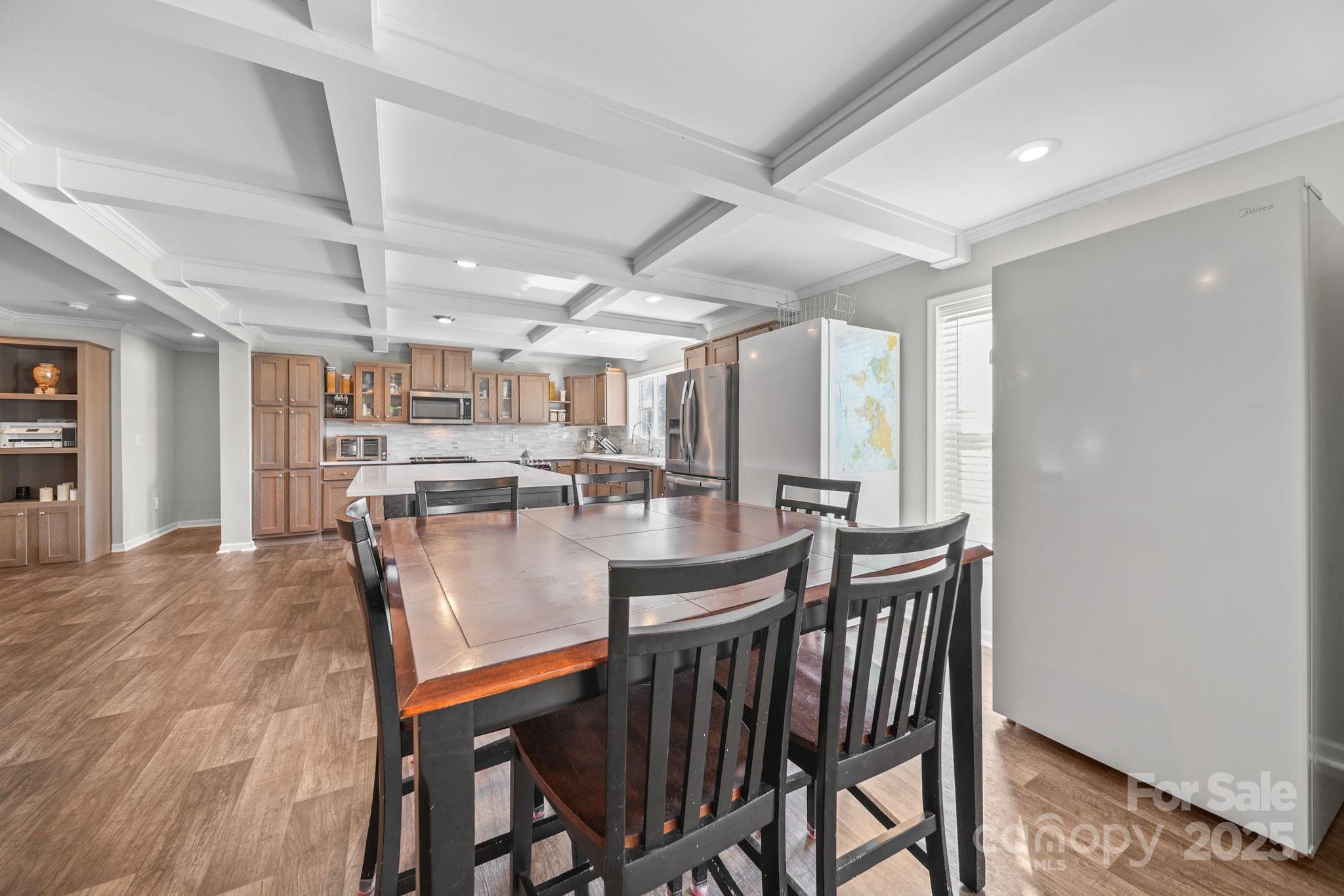 428 Long Branch Jefferson, SC 29718 - Photo 13 of 27 a view of a dining room with furniture and a rug