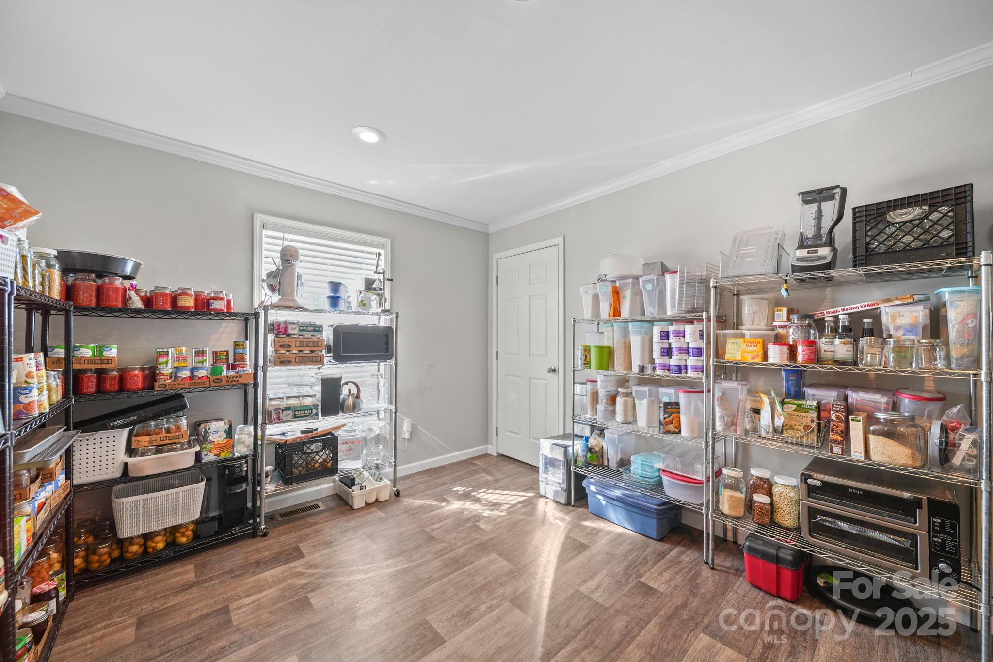 428 Long Branch Jefferson, SC 29718 - Photo 20 of 27 a room with storage and utility