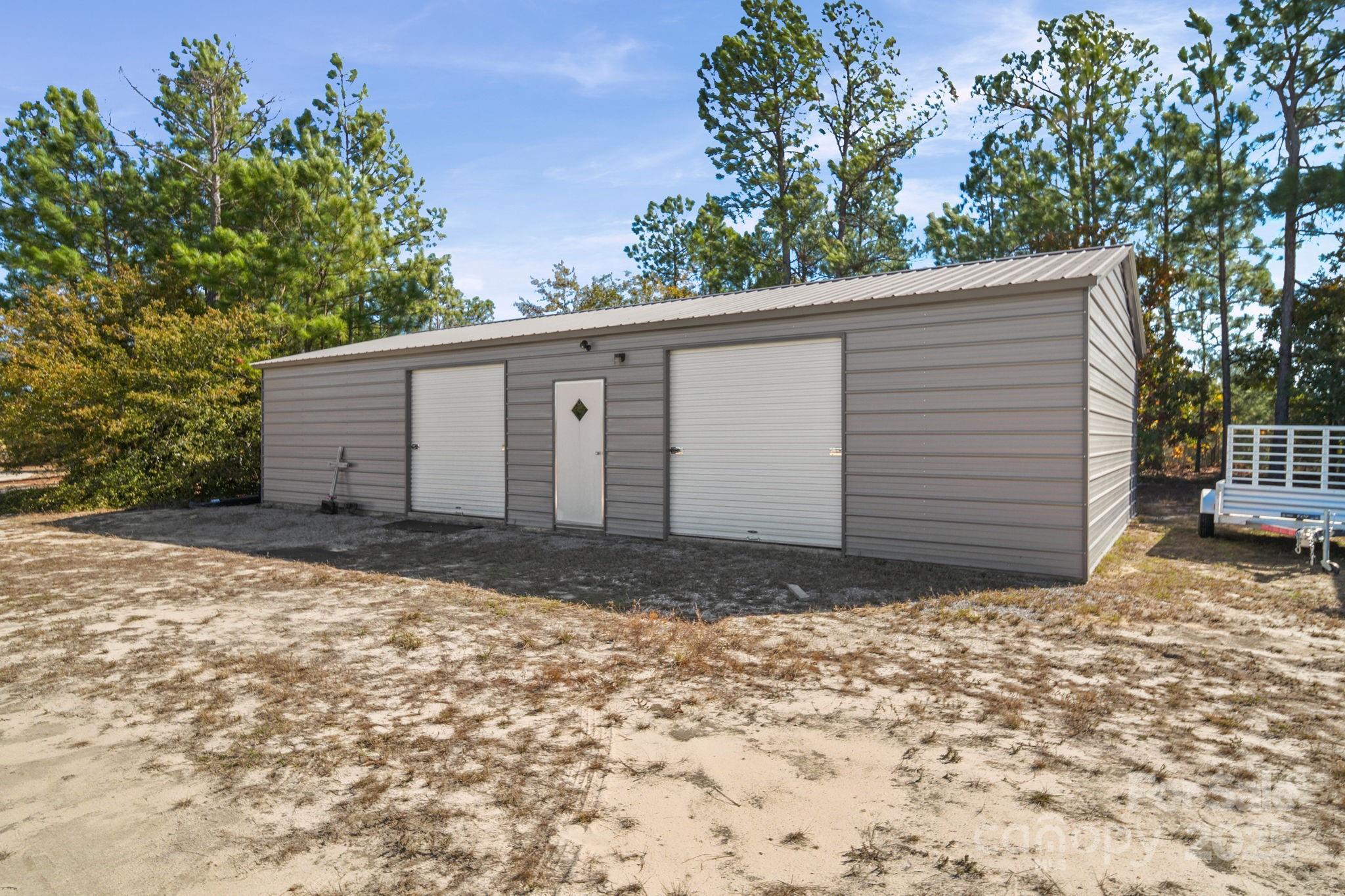 428 Long Branch Jefferson, SC 29718 - Photo 2 of 27 a view of a house with a yard