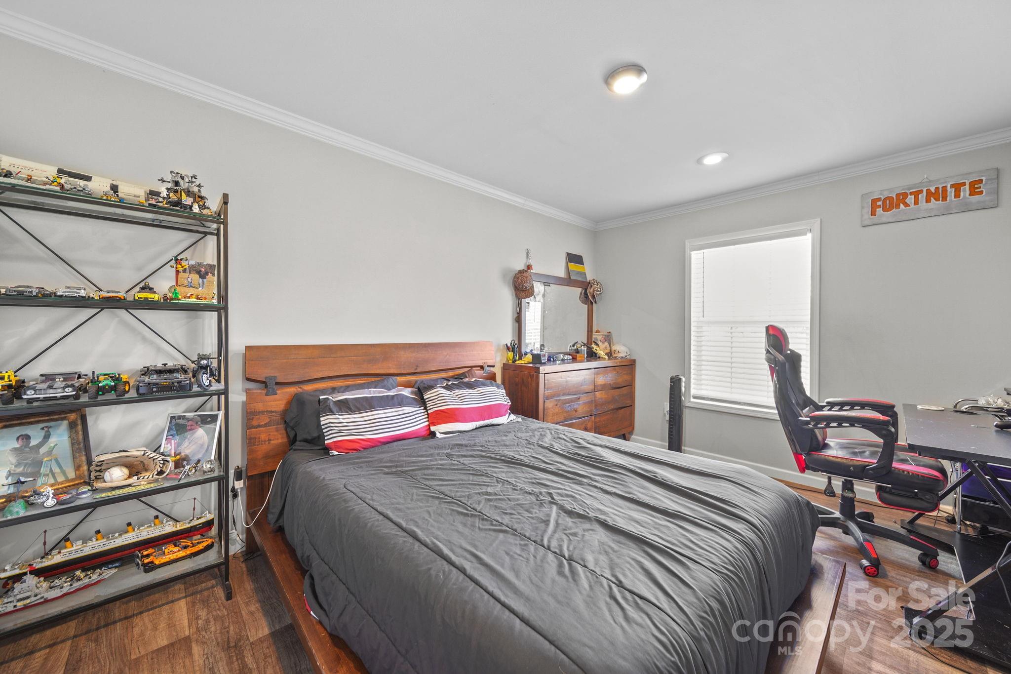 428 Long Branch Jefferson, SC 29718 - Photo 21 of 27 a bedroom with a bed and a window