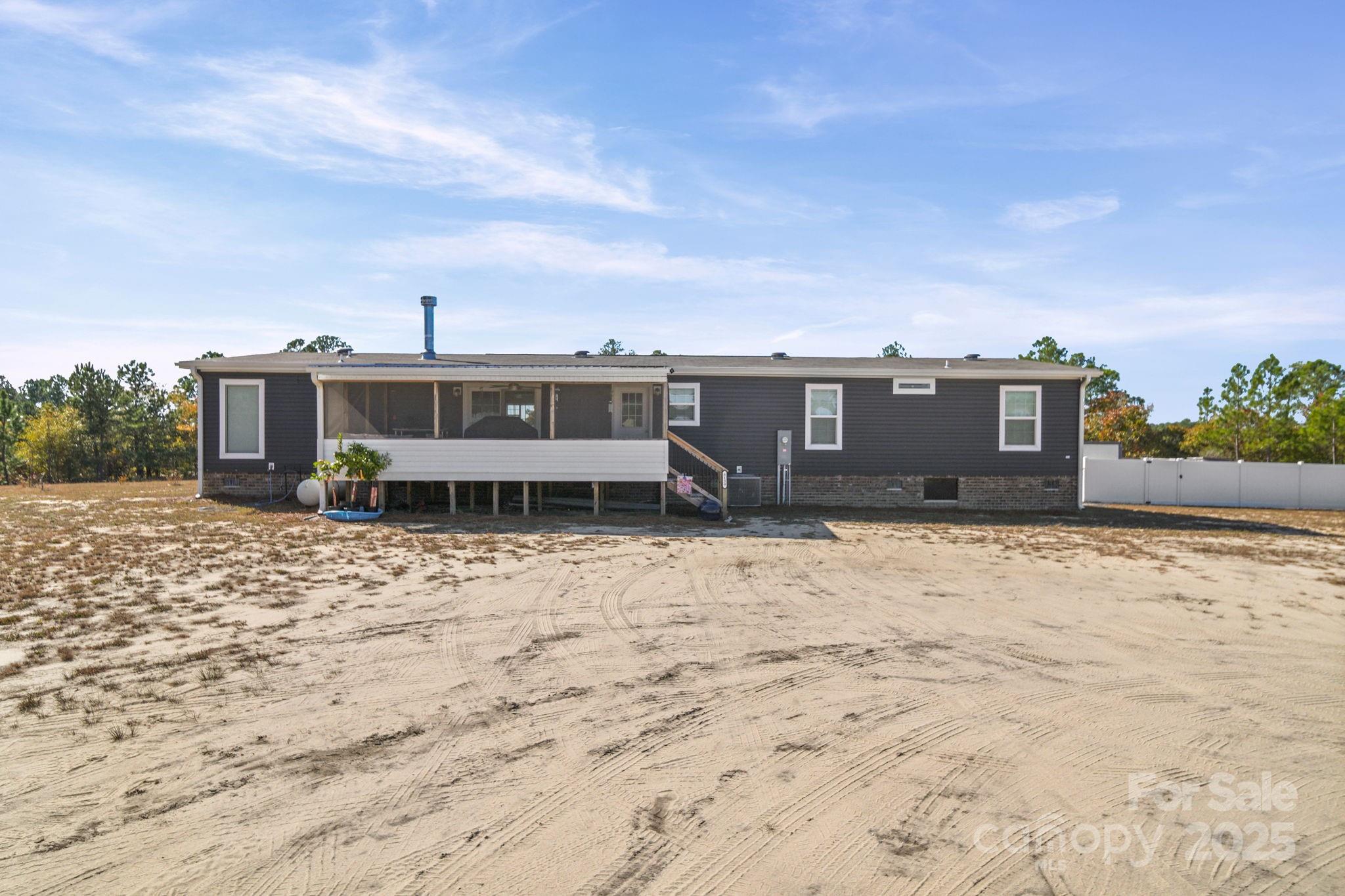 428 Long Branch Jefferson, SC 29718 - Photo 23 of 27 a view of a house with a yard