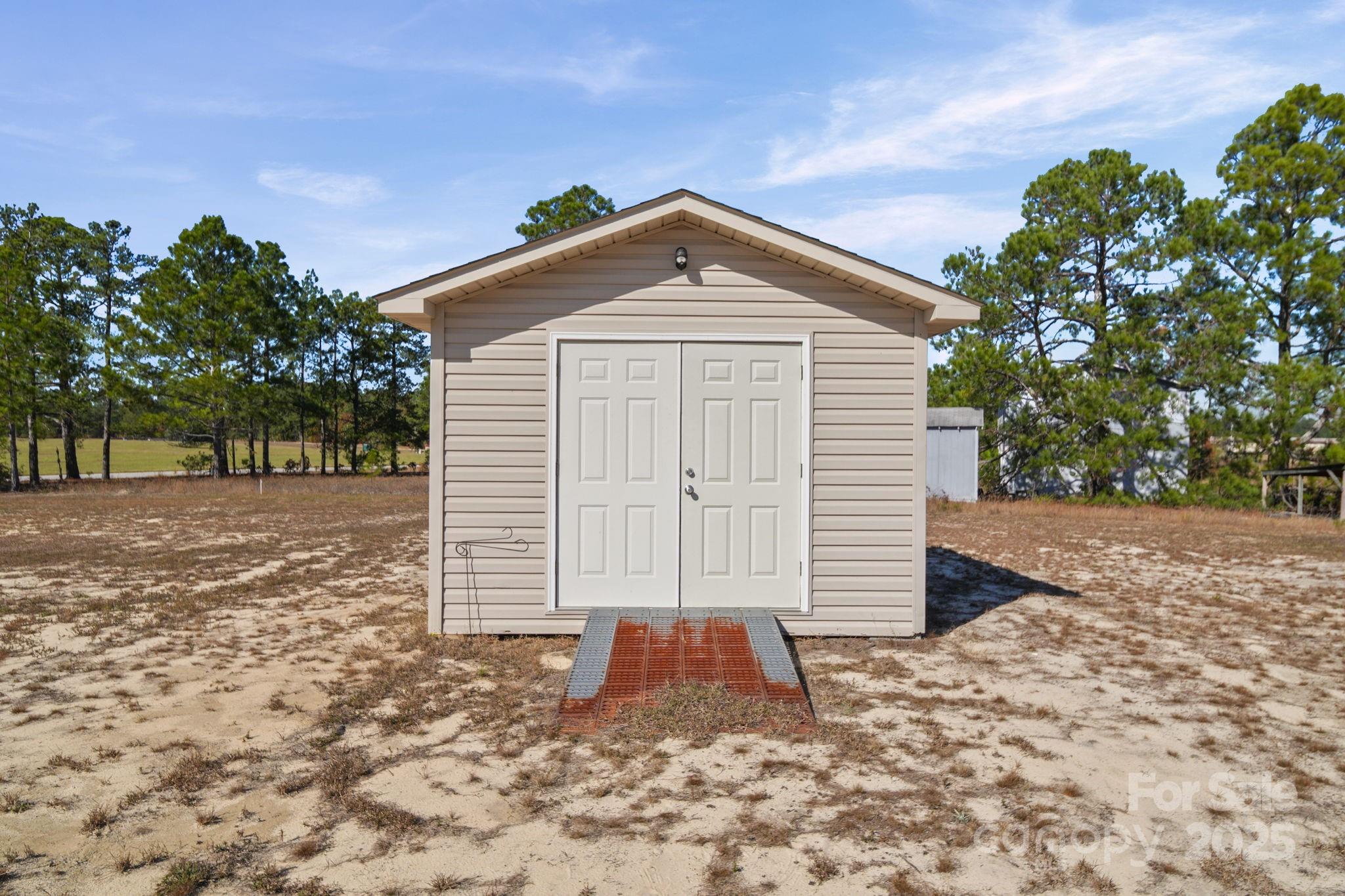 428 Long Branch Jefferson, SC 29718 - Photo 25 of 27 a view of a house with a yard