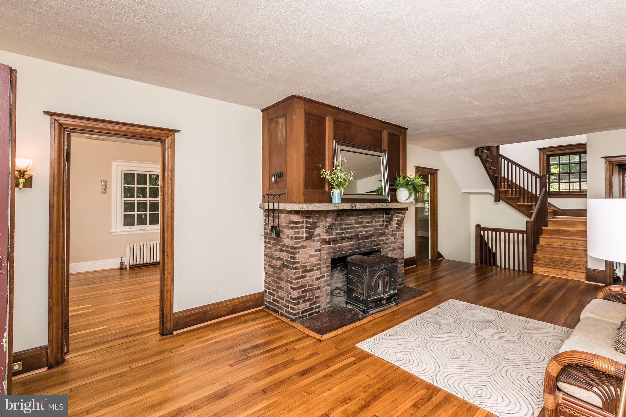 212 Longwood Road Baltimore, MD 21210 - Photo 3 of 30 a living room with furniture and a fireplace