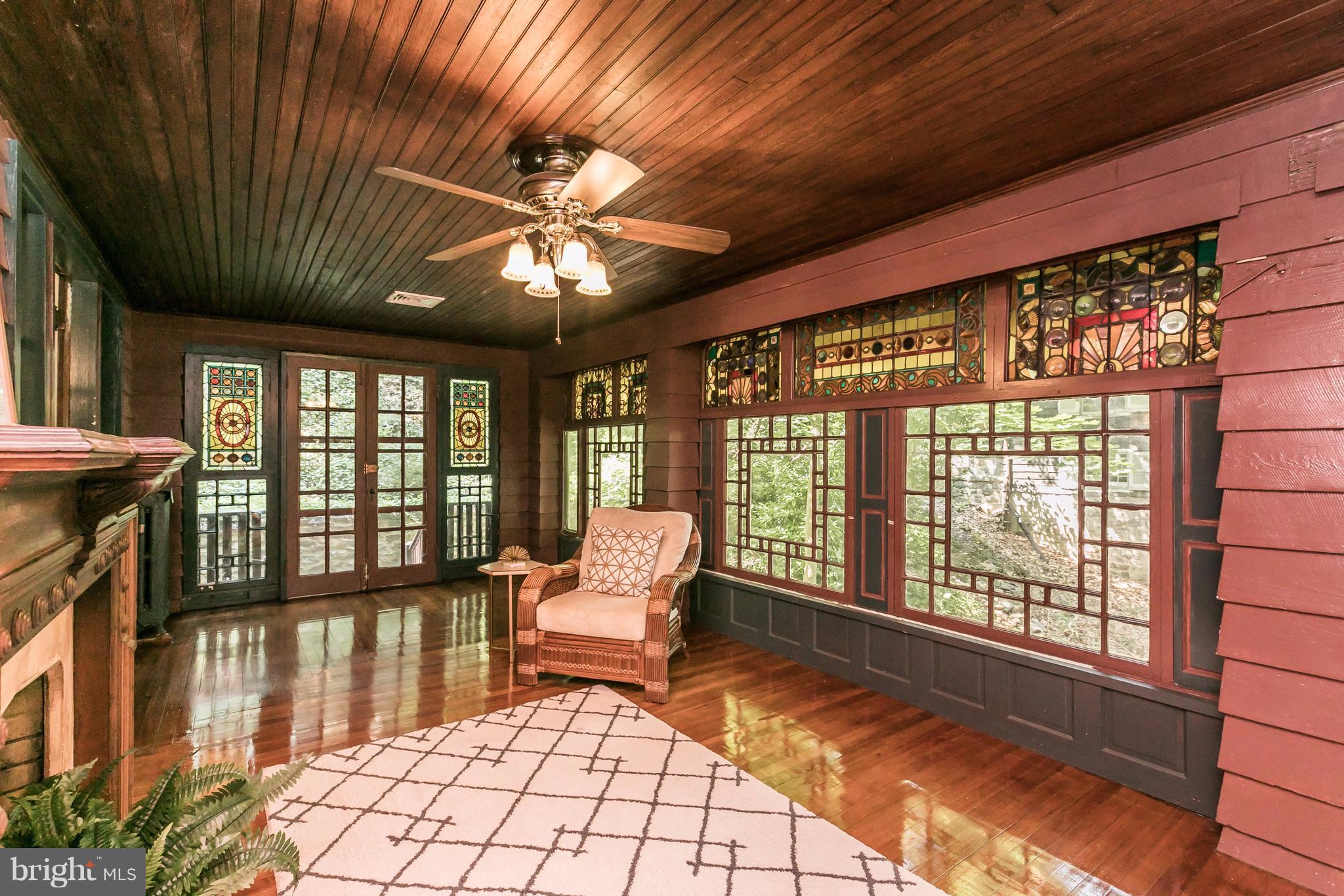 212 Longwood Road Baltimore, MD 21210 - Photo 6 of 30 a living room with furniture and a large window
