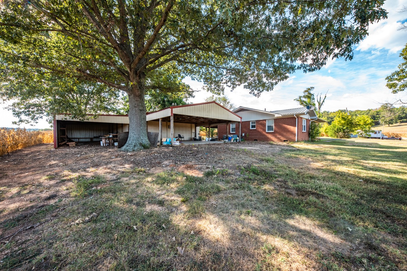 1318 Vise Loop Decaturville, TN 38329 - Photo 13 of 61 a view of a house with a yard and sitting area