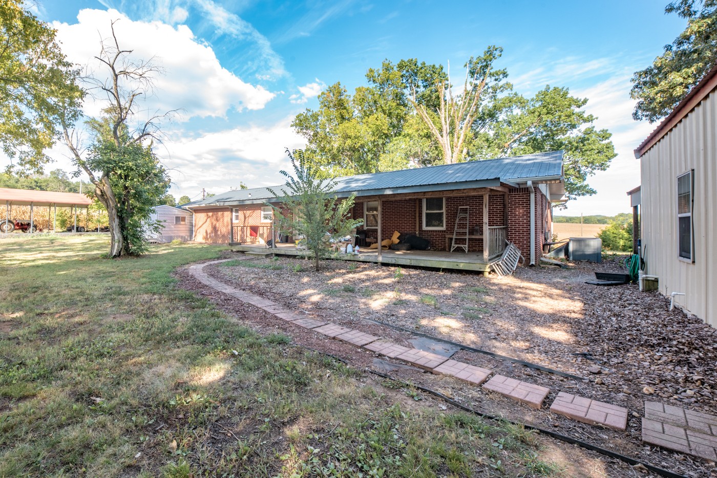 1318 Vise Loop Decaturville, TN 38329 - Photo 18 of 61 a front view of a house with garden