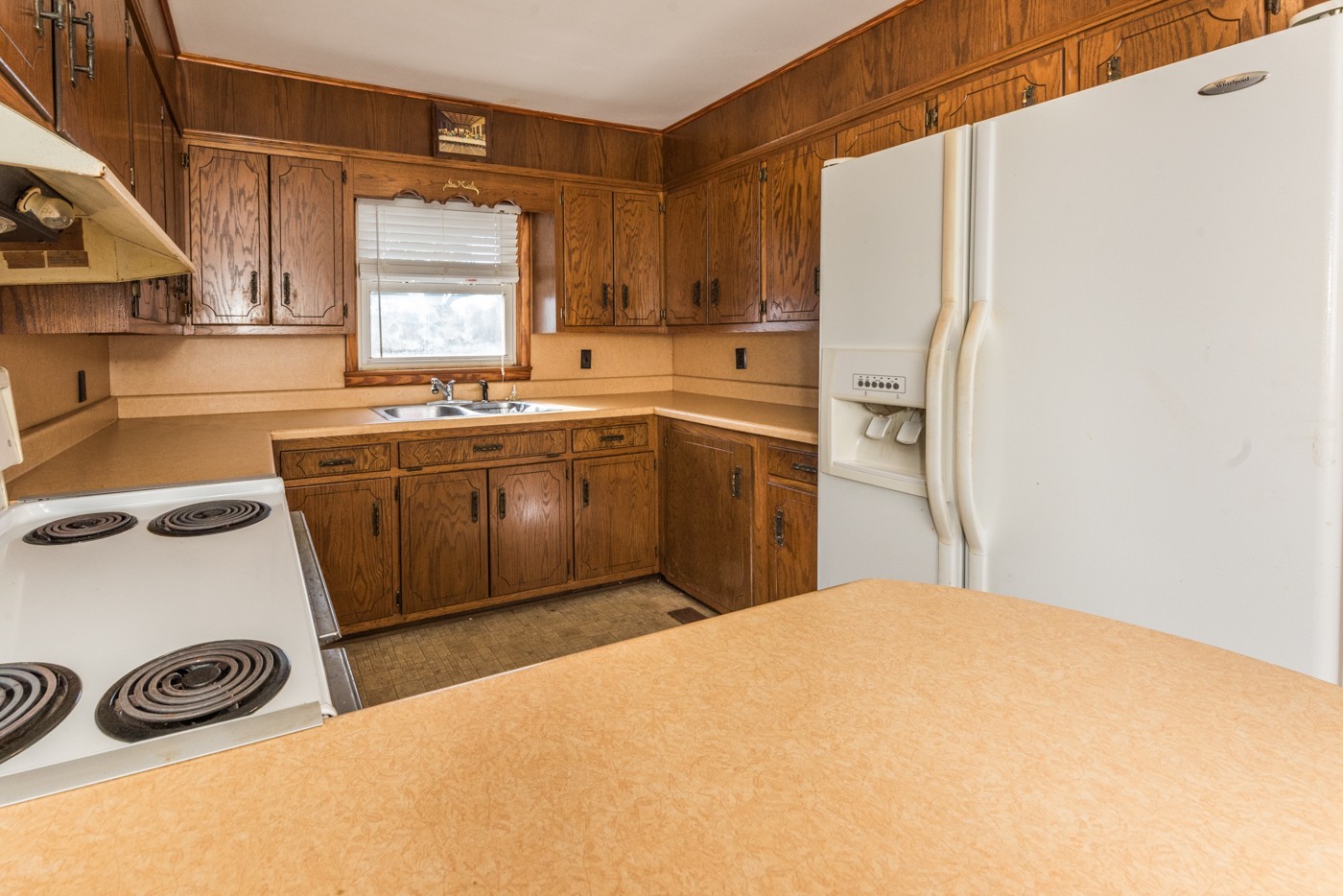 1318 Vise Loop Decaturville, TN 38329 - Photo 32 of 61 a kitchen with stainless steel appliances a sink a stove a refrigerator and cabinets